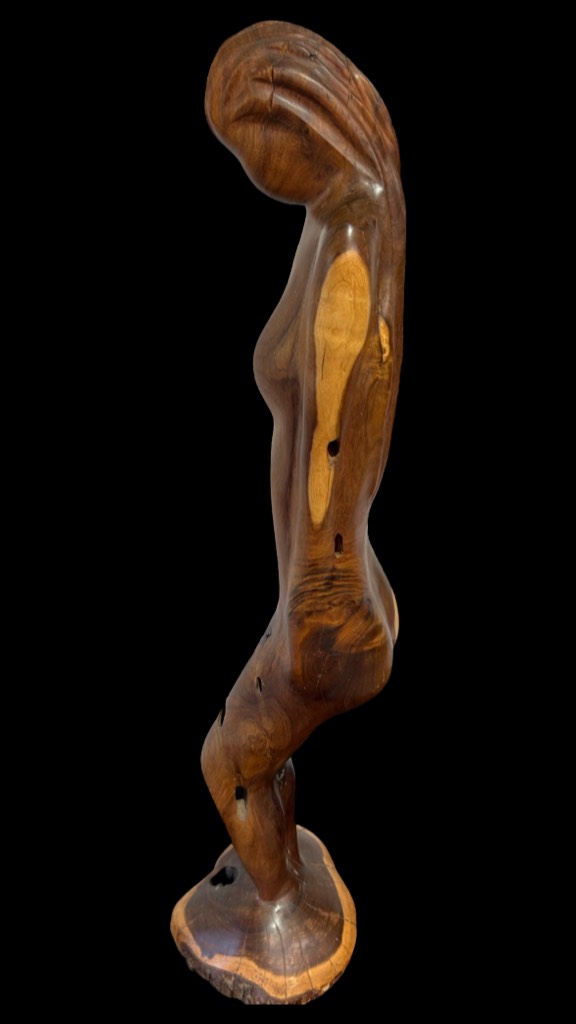 The Loss of a Woman. This timber sculpture has been hand crafter with black wood. 1000cm high & Aprox. 15 Kilograms.
